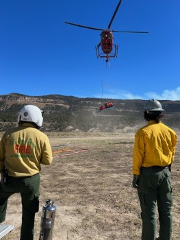 Airborne helicopter carries helitorch equipment