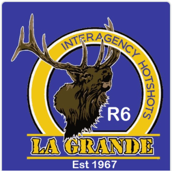 A logo with a bull elk and the word La Grande