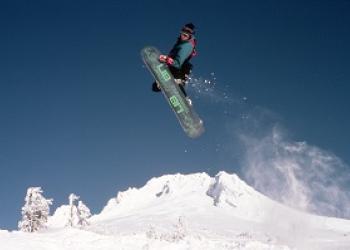 Snowboarder jumping