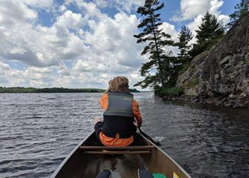 Rec Banner: Man Canoeing