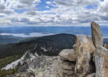 Standing at Chimney Rock looking down across Priest Lake  