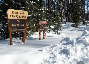 Photo of the River Point Campground at Seeley Lake in wintertime, Lolo National Forest, Montana.
