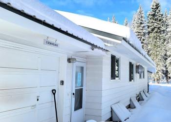 Image of the cookhouse in the wintertime at the historic Savenac area on the Lolo National Forest, Montana.
