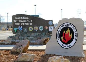 National Interagency Fire Center Sign on a big rock