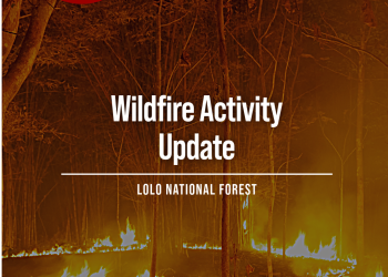 Fire burning in the forest with language, Wildfire activity update, Lolo NF