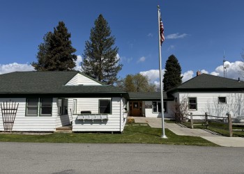 Photo of the Plains/Thompson Falls Ranger Station in Plains, Montana on an early spring day.