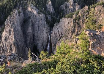 View of a distant waterfall in a canyon