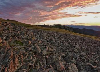 A rocky landscape at sunset