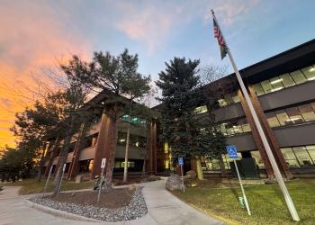 Front of building at sunrise