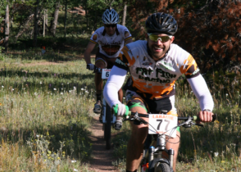 two mountain bikers on trail