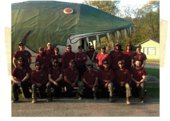 Hotshot crew in front of giant fish
