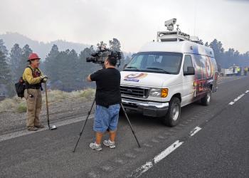 Media interview during a wildfire.