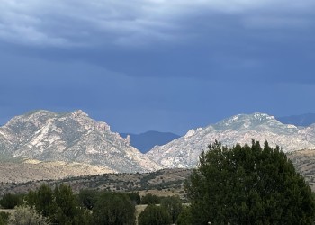 Photo of distant mountains in sunlight