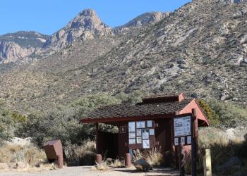 example of a day use site entry sign and trail leading to picnic site