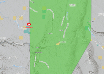 A map displaying an evacuation area due to a wildfire.