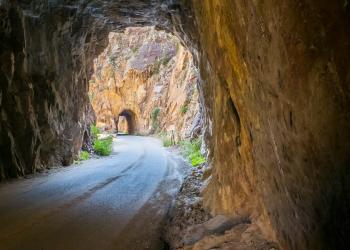 Road through mountain tunnels