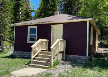 The exterior view of the Big Flat Guard Station Cabin located on the Fishlake National Forest