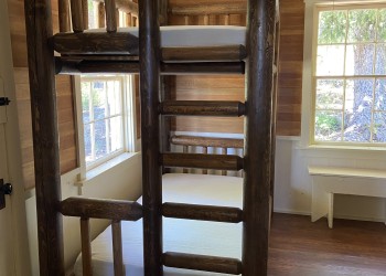 The second set of bunk beds in the cabin have a twin mattress on both the top and bottom bunk. No bedding is provided and must be brought in with guests.