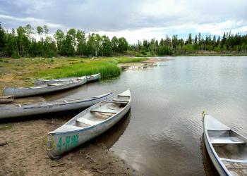 Canoes on the shore of Tushar Lakeside campground. A popular water recreation area operated by Beaver County on the Fishlake National Forest