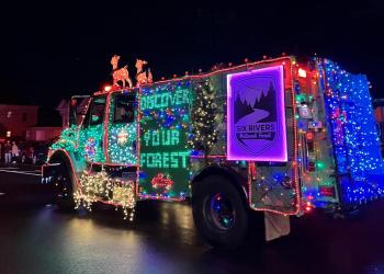 Forest Service fire engine decorated in Christmas lights
