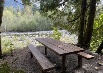 picnic table by river