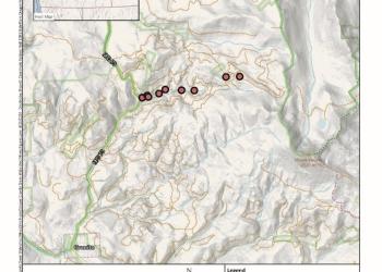A map showing red dots were mines are located.