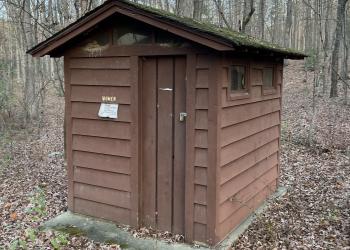 Women's vault toilet