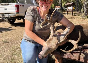 woman with hunted deer