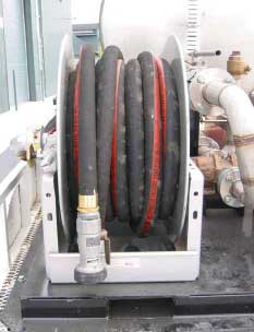 Photo of a hose with dry break coupler.