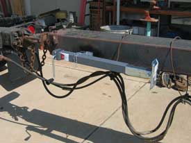 RV jack to support trailer 'reach' when trailer is disconnected.