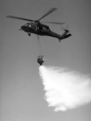 National Guard Black Hawk dropping water