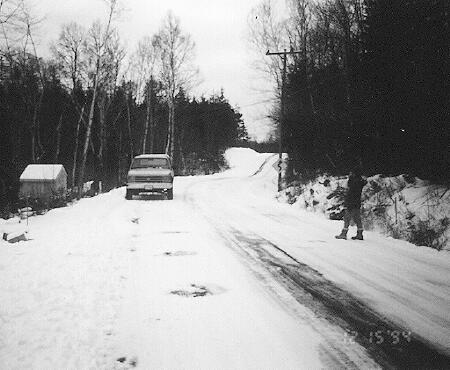 Figure 62White Mountain National Forest site on December 15, 1994. The shed on the side of the road housed the data-logger equipment.