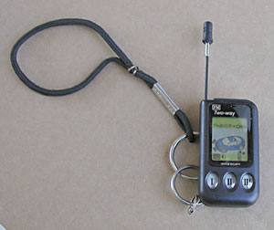 The handheld transmitter has a concealed antenna that can be extended to improve signal range. This tiny device measures 1" wide x 1-1/2" attaches to a key chain or lanyard to help prevent it from being lost.