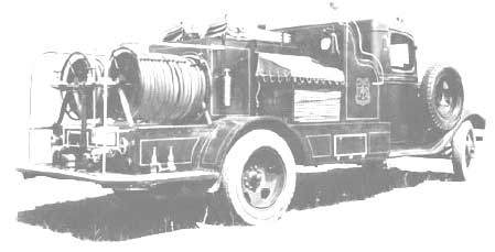 Image of an antique Forest Service fire engine.