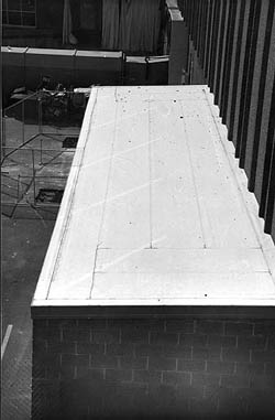 Photo of an utility addition covered with a thermoplastic-resin roof.
