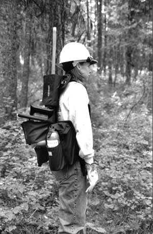Image of a person wearing the macKenzie "Mack" chain saw pack by Frontline Safety Gear (side View).