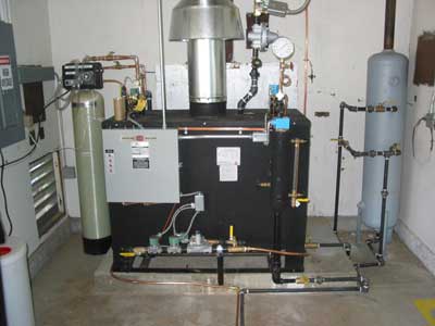 [photo] Steam boiler used to heat sterilization room.