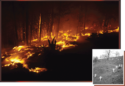 There are two photos in this image.  The larger image is of a fire actively burning and the other smaller image is of a hillside with several small crosses in the ground. 