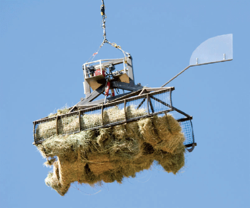 Photo of a loaded heli-claw in flight.