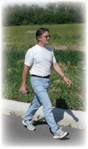 Photo of a man walking.
